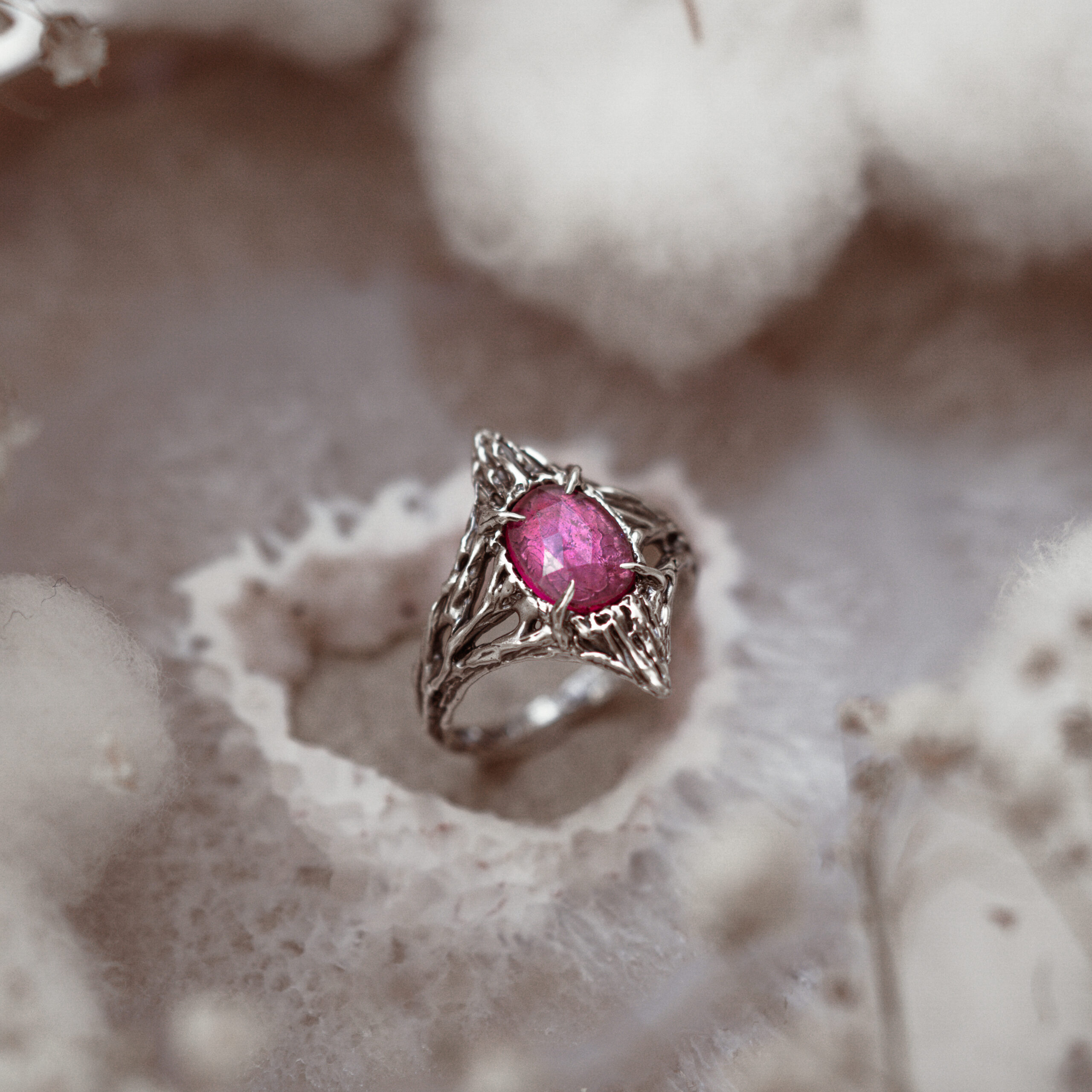 silver ring pink tourmaline on mineral background